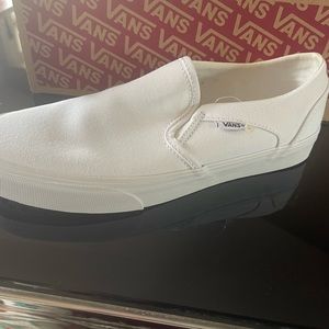 Vans White Slip on Shoes.  Brand new with tags and box.